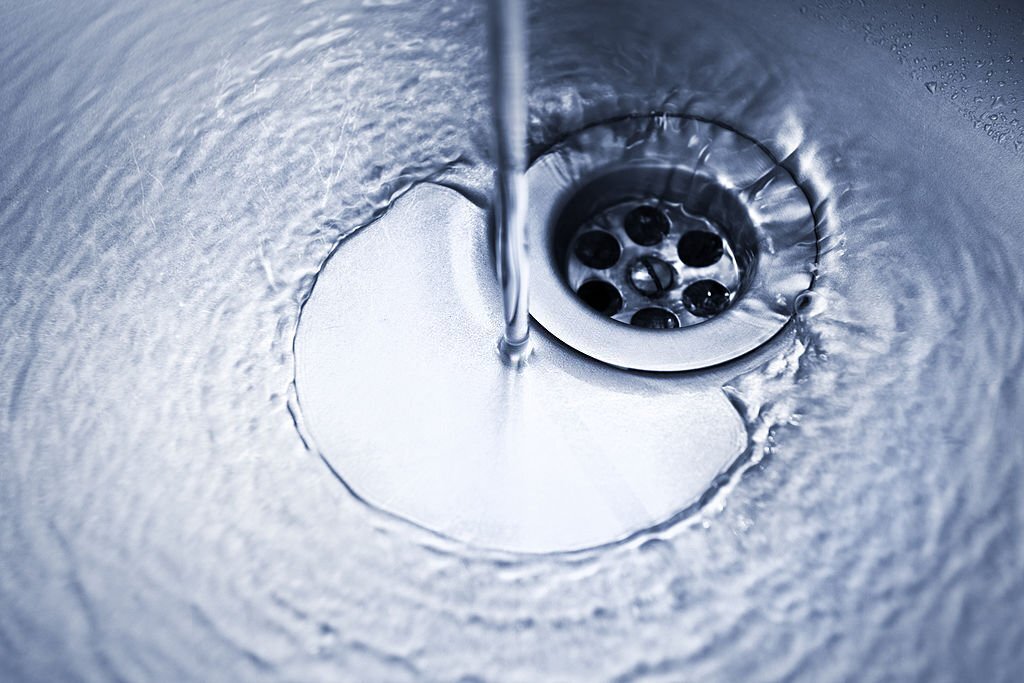 62e60a781c501 drain with waterrunning kitchen faucet (darker variation shot)running kitchen faucet