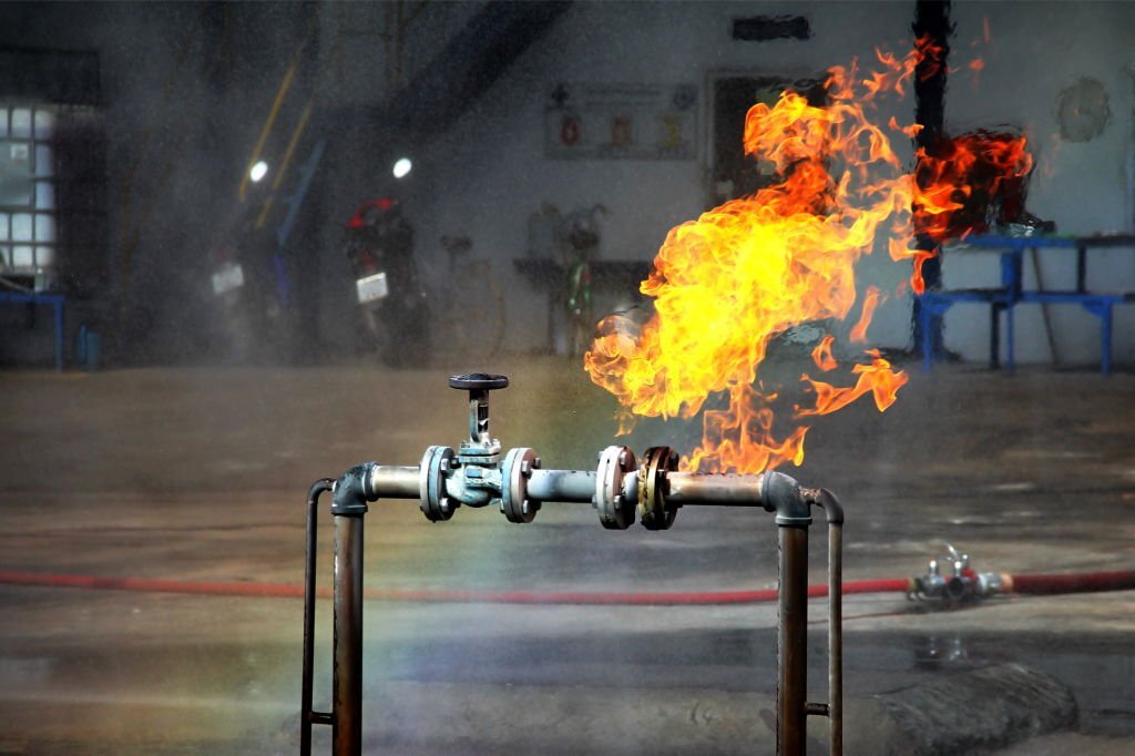 62e637c943408 Gas pipeline leaks at the joints with the valve. Spark and Fire on the gas pipeline. An explosion at the gas pipeline.